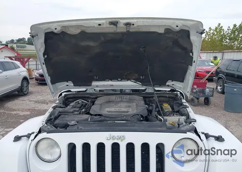 2015 Jeep Wrangler Unlimited Sahara из США, поврежденный, VIN 1C4BJWEG2FL527687